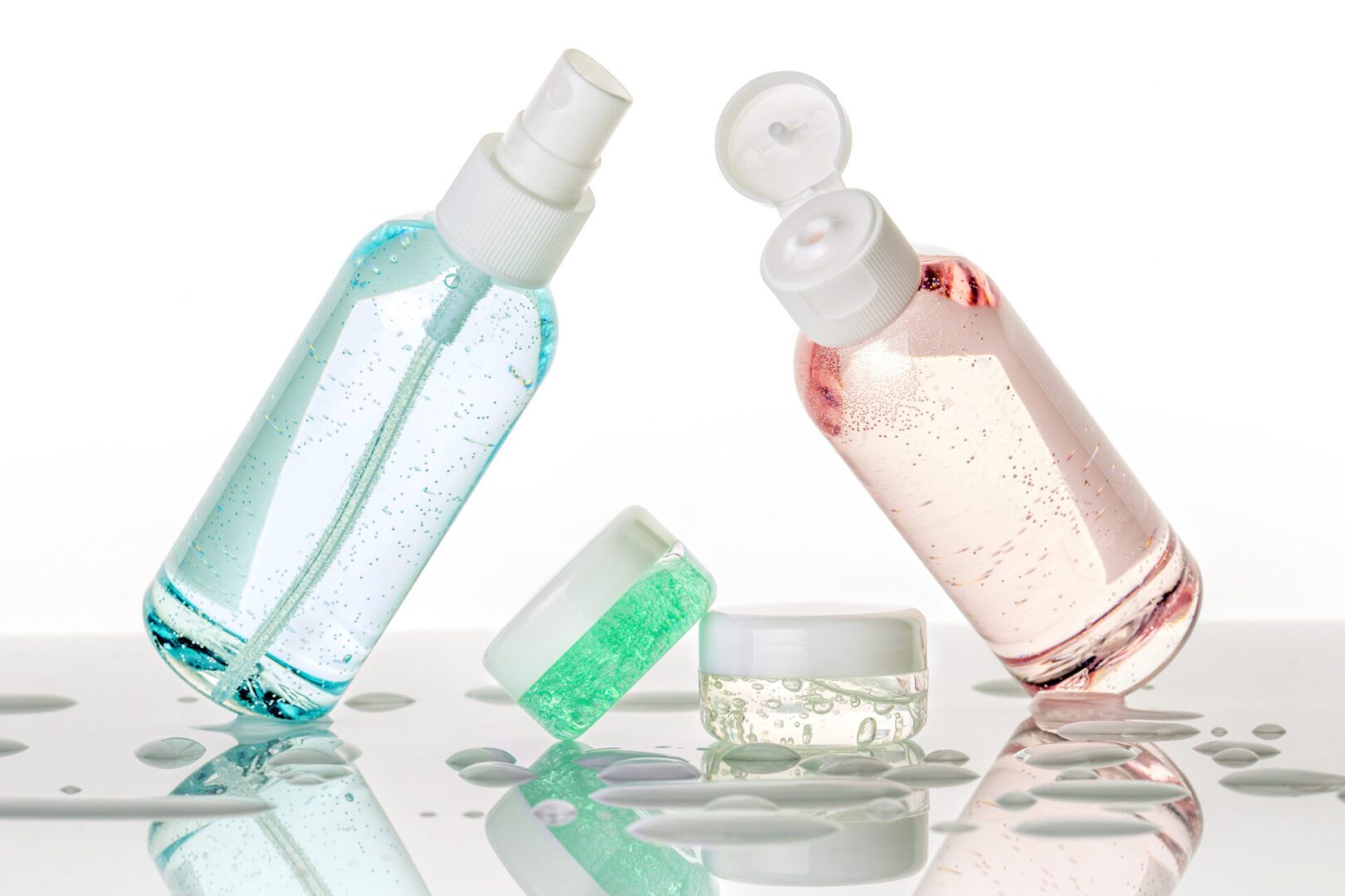 Here's an alt tag for the image: Bottles and jars of skincare products.